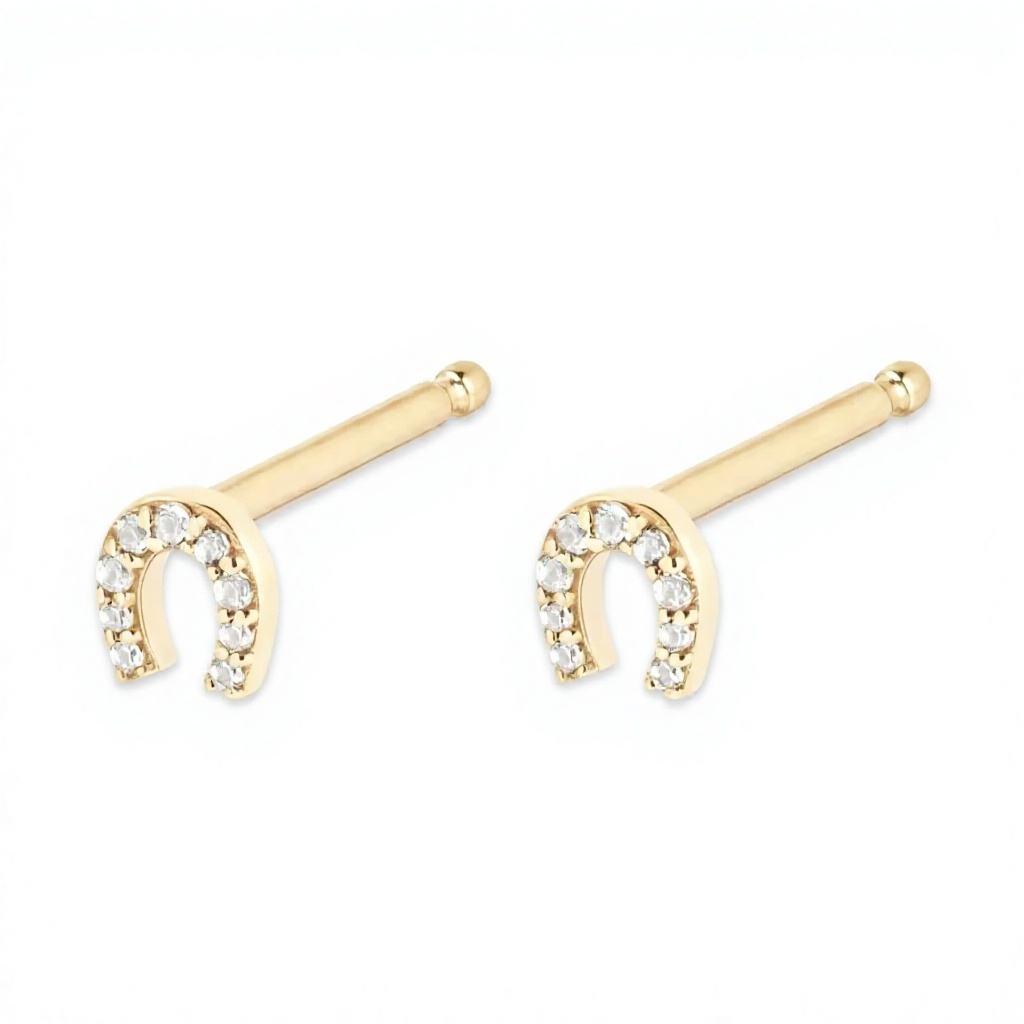 Micro Horseshoe Studs in Gold